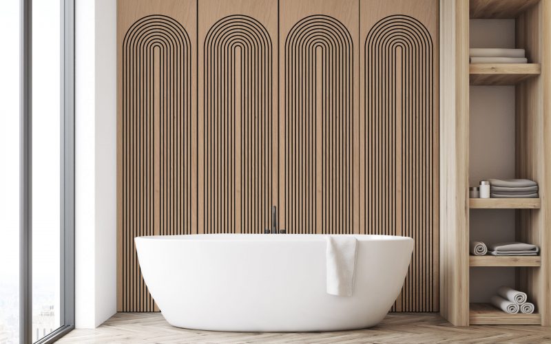 Bathroom with closet and white wall